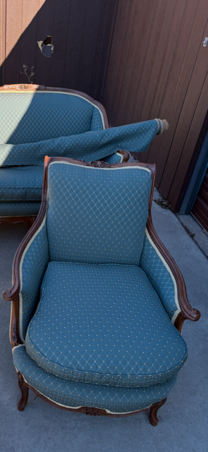 Same armchair after reupholstery in blue fabric by CertiRestore